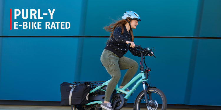 rider on e-bike wearing ABUS PURL-Y helmet
