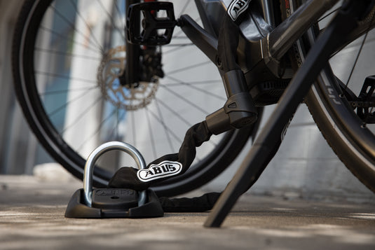 bike and anchor locking a bike