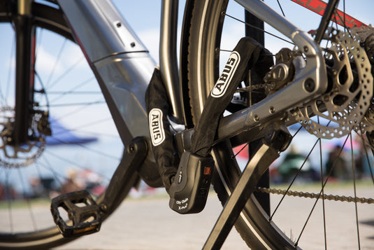 e-bike locked to bike rack with 1060 chain