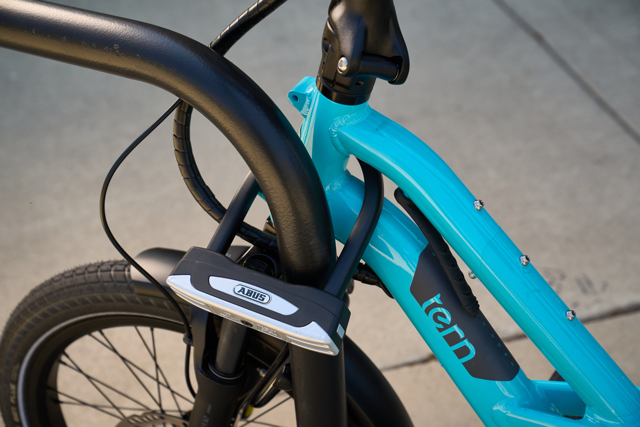 Load image into Gallery viewer, blue bike secured to bike rack with ABUS GRANIT XPLUS 54 Mini #size_145mm
