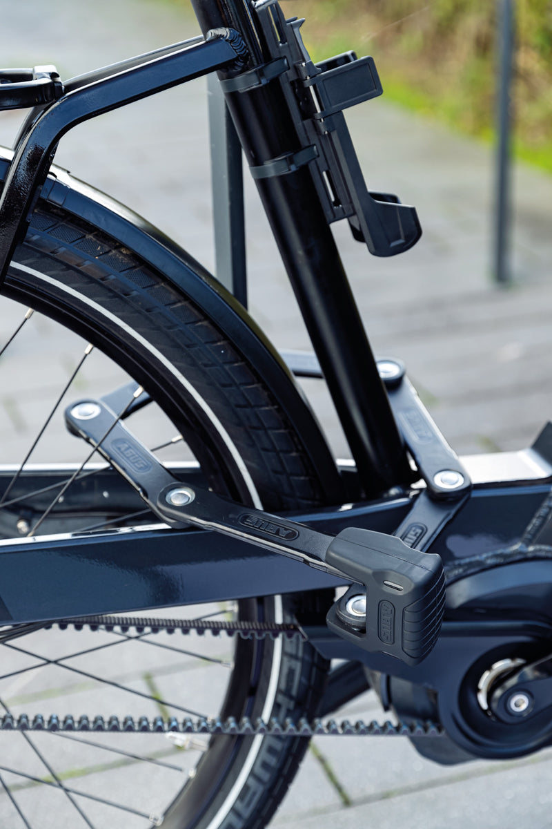 Load image into Gallery viewer, ABUS Bordo XPlus 6500 securing e-bike to rack through rear wheel #size_90cm
