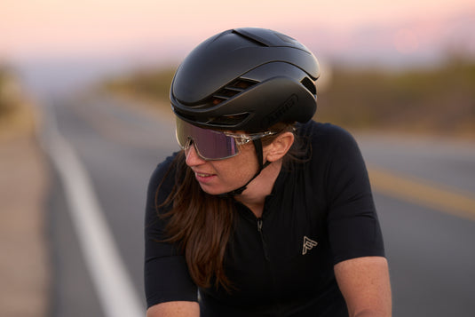 cyclist in black kit wearing black ABUS GameChanger 2.0 helmet