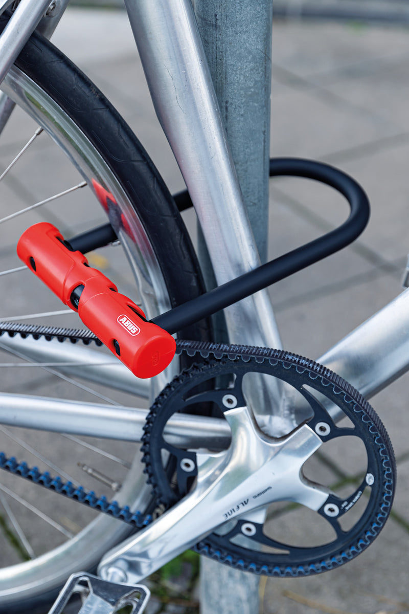 Load image into Gallery viewer, Bicycle locked with a red U-lock on a metal stand #size_230mm
