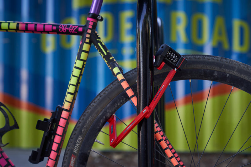 Load image into Gallery viewer, Red Bordo 5700C securing colorful bicycle to rack. #color_red
