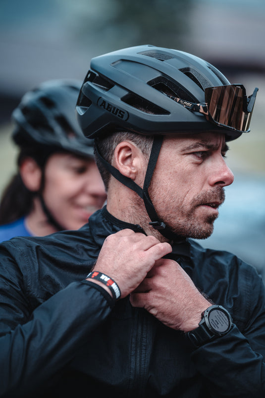 cyclsit wearing black PowerDome helmet