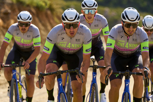 team of road cyclist wearing white ABUS GameChanger helmets 