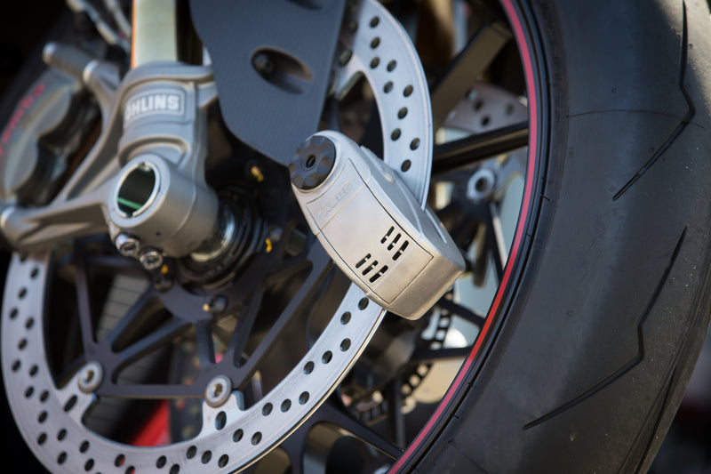 Load image into Gallery viewer, Image of Detecto 8008 on rotor of motorcycle.
