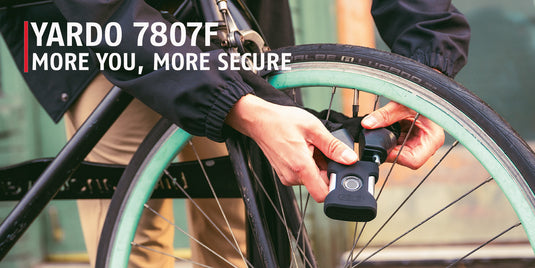 Person unlocking bike that is secured with the Yardo 7807F